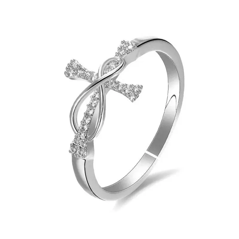Livraison Express Bague femme réglable croix infini zirconiums blancs sertis