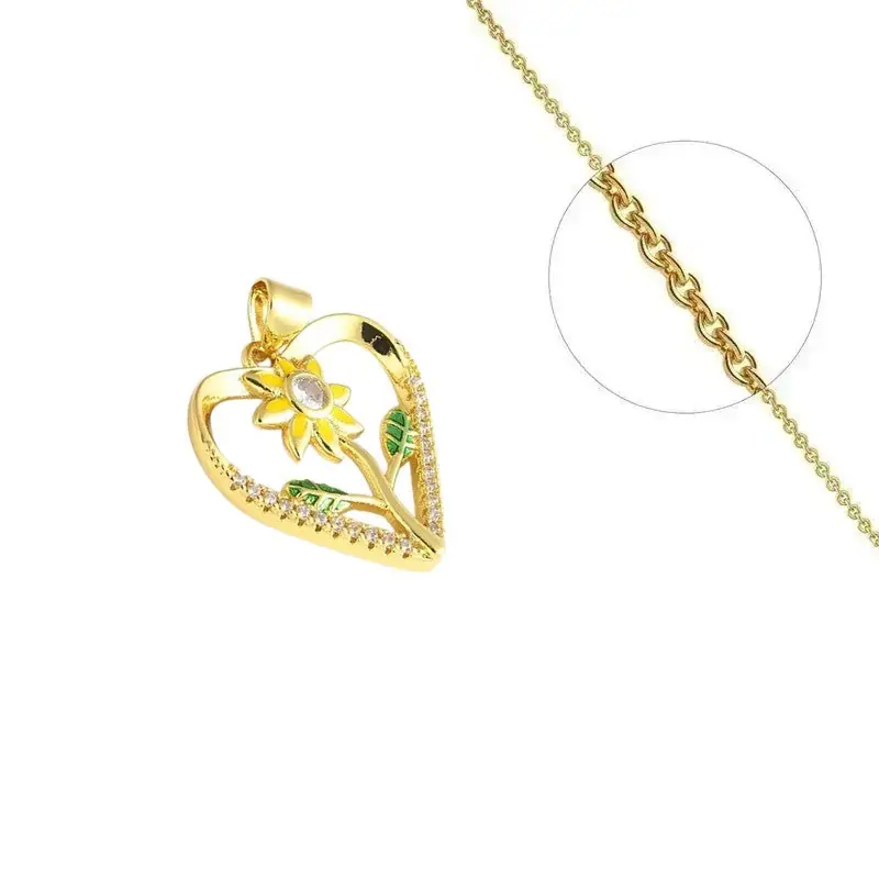 Remise Collier doré chaîne et pendentif fleur dans un cœur orné de zirconiums sertis
