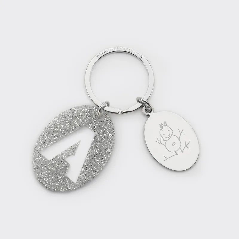 Porte-clés personnalisé médaille gravée ovale acier et breloque initiale acrylique pailleté argenté Soldes