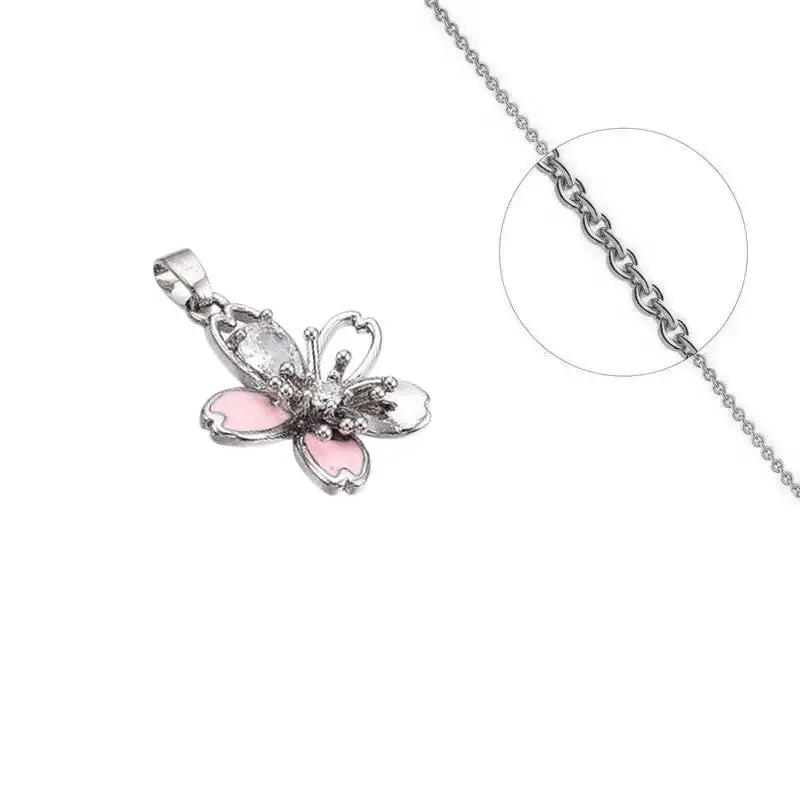 Prix Réduit Collier doré chaîne et pendentif fleur émail zirconiums sertis