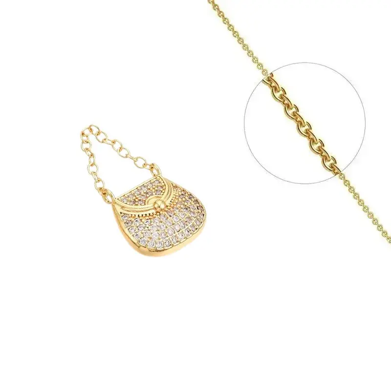 Collier doré chaîne et pendentif sac à main zirconiums sertis Certifié