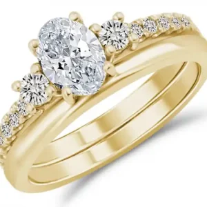 Set d'alliances Ovation trinité pavé diamant central laboratoire de taille ovale en or jaune 14k Offre Du Jour