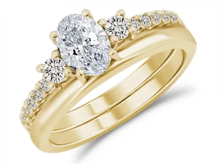Set d'alliances Ovation trinité pavé diamant central laboratoire de taille ovale en or jaune 14k Offre Du Jour