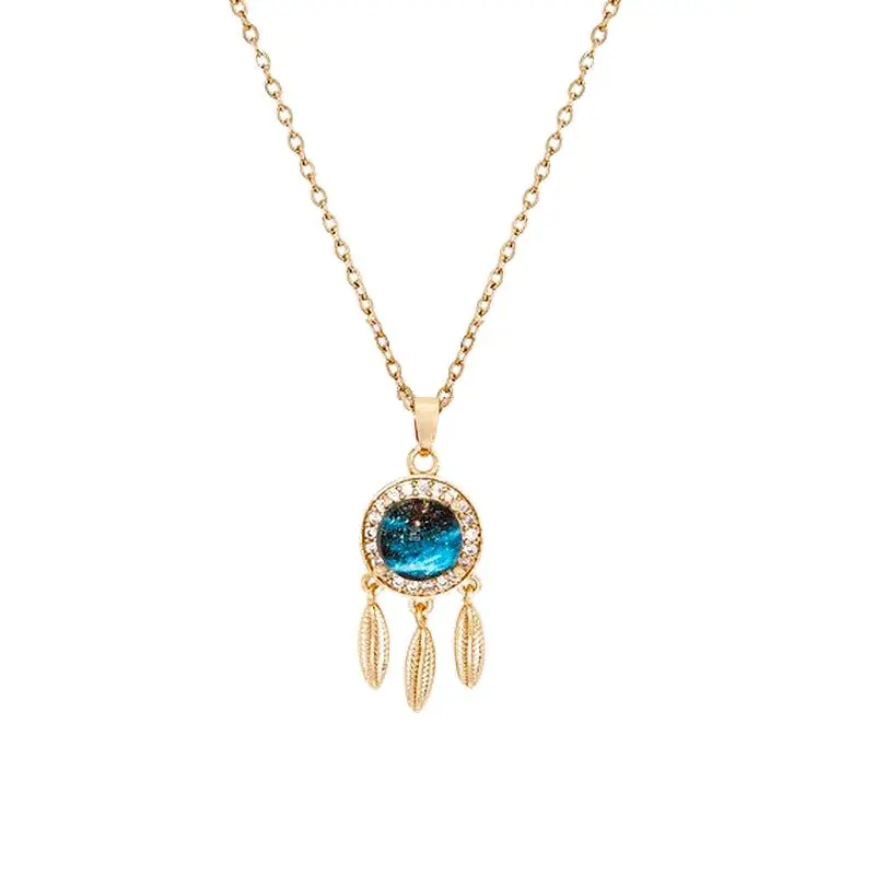 Must-Have Collier chaîne et pendentif attrape rêve avec zirconiums sertis