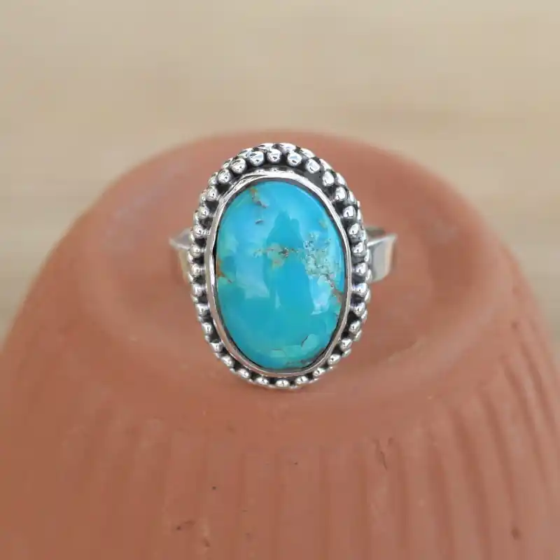 Solde Petite bague ovale pierre Turquoise d'Arizona et argent cisele (bleu) T55