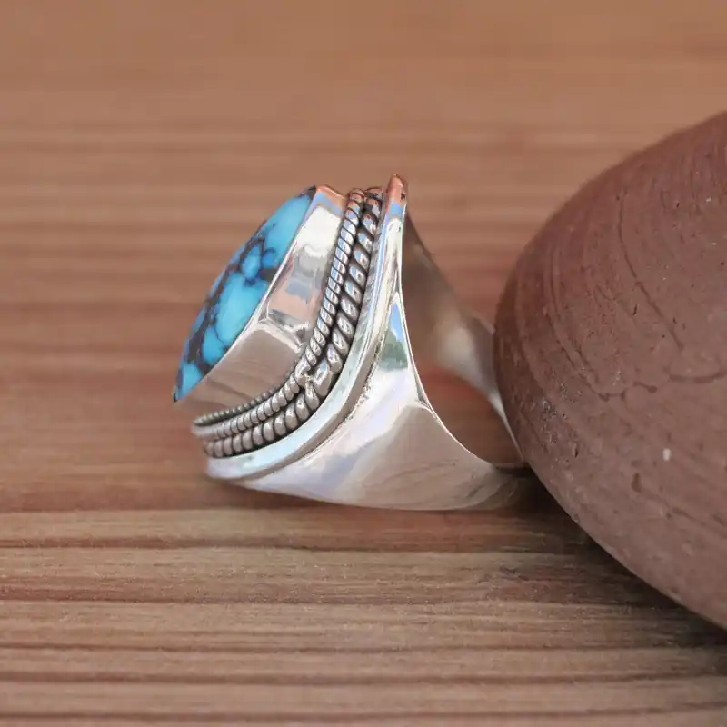 Réduction Chevaliere argent et pierre navette Turquoise du Tibet (bleu) T59