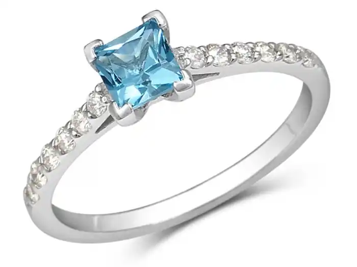 Bague Karly solitaire pavé topaze bleue taille princesse et diamants en or blanc 14k Marque