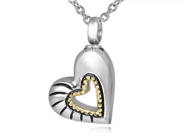 Pendentif reliquaire pour cendres cœur ajouré doré et motifs antiques en acier inoxydable Prix Bas
